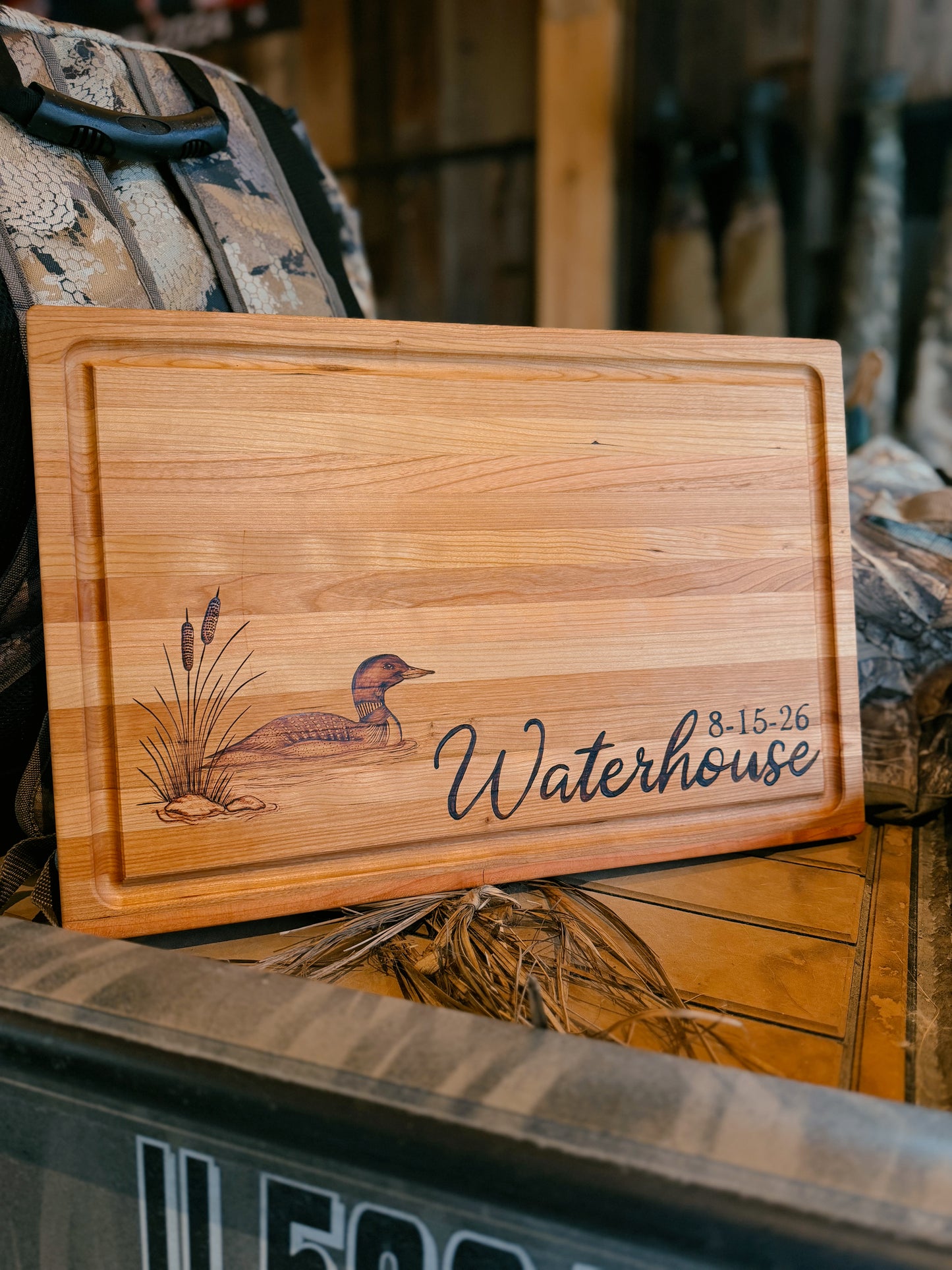 Custom loon scene woodburned board