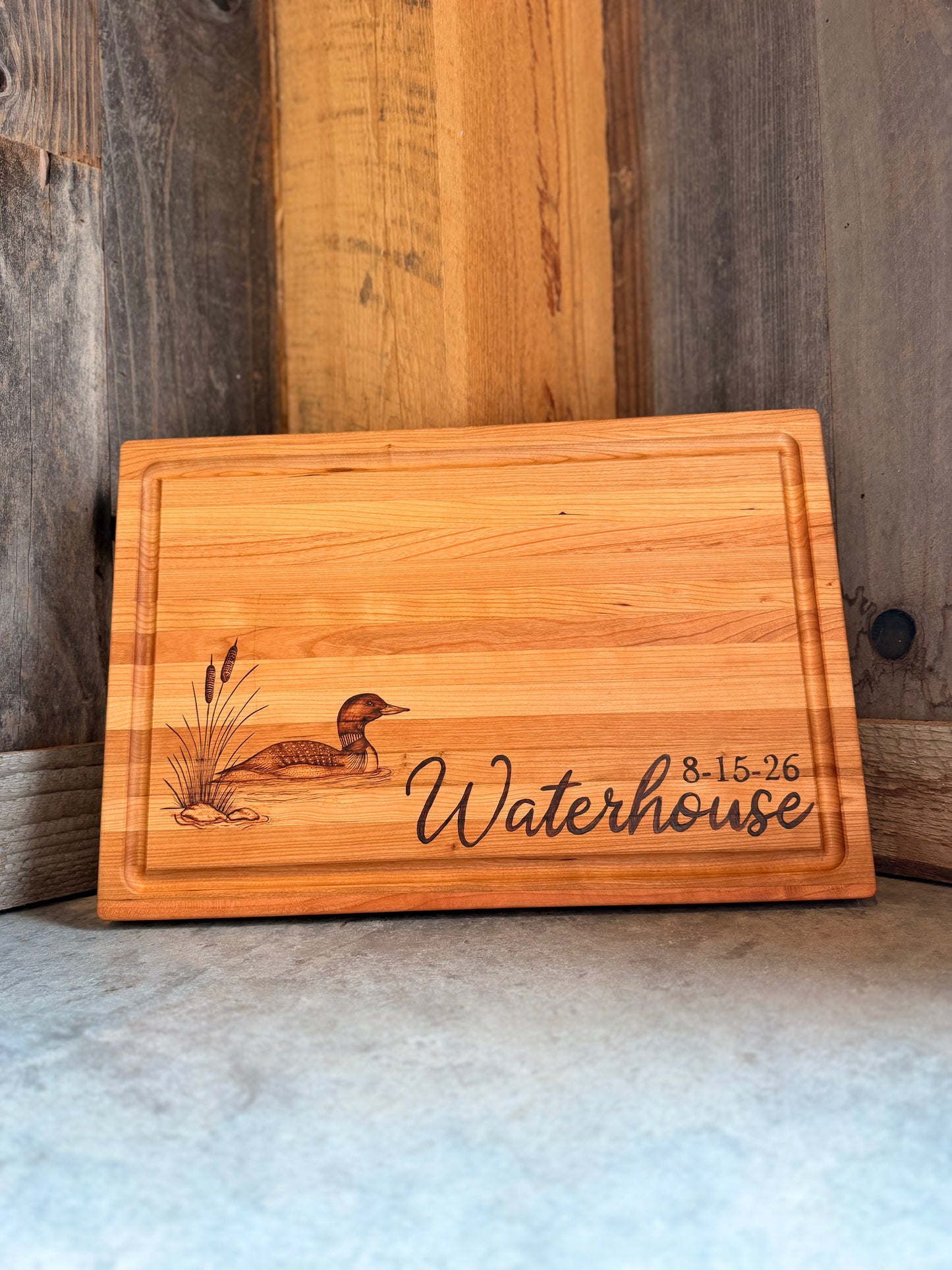 Custom loon scene woodburned board